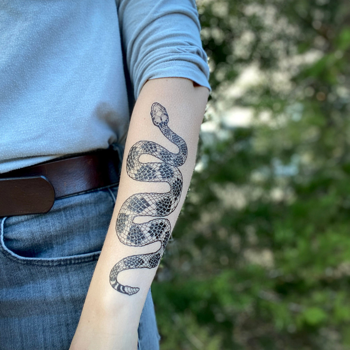Rattlesnake Tattoo: The Ultimate Festival Accessory for Wild Souls