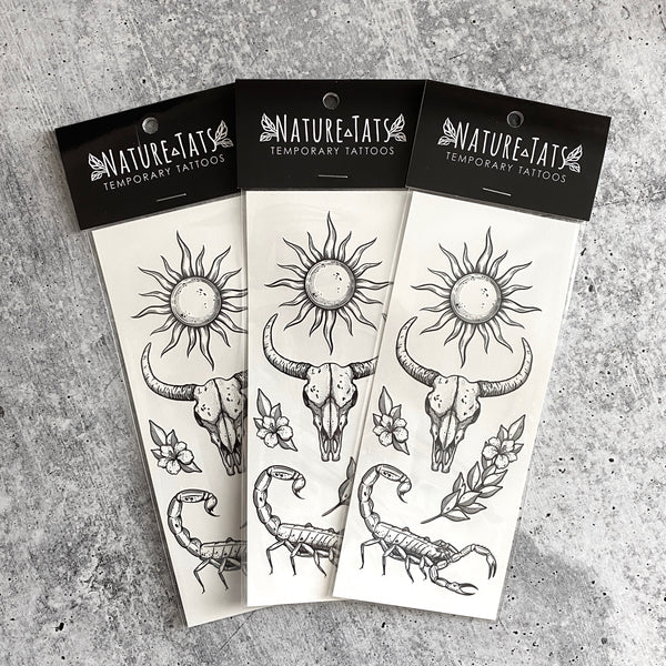 sunlit south temporary tattoos in packaging on a grey background 