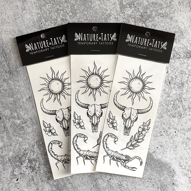sunlit south temporary tattoos in packaging on a grey background 