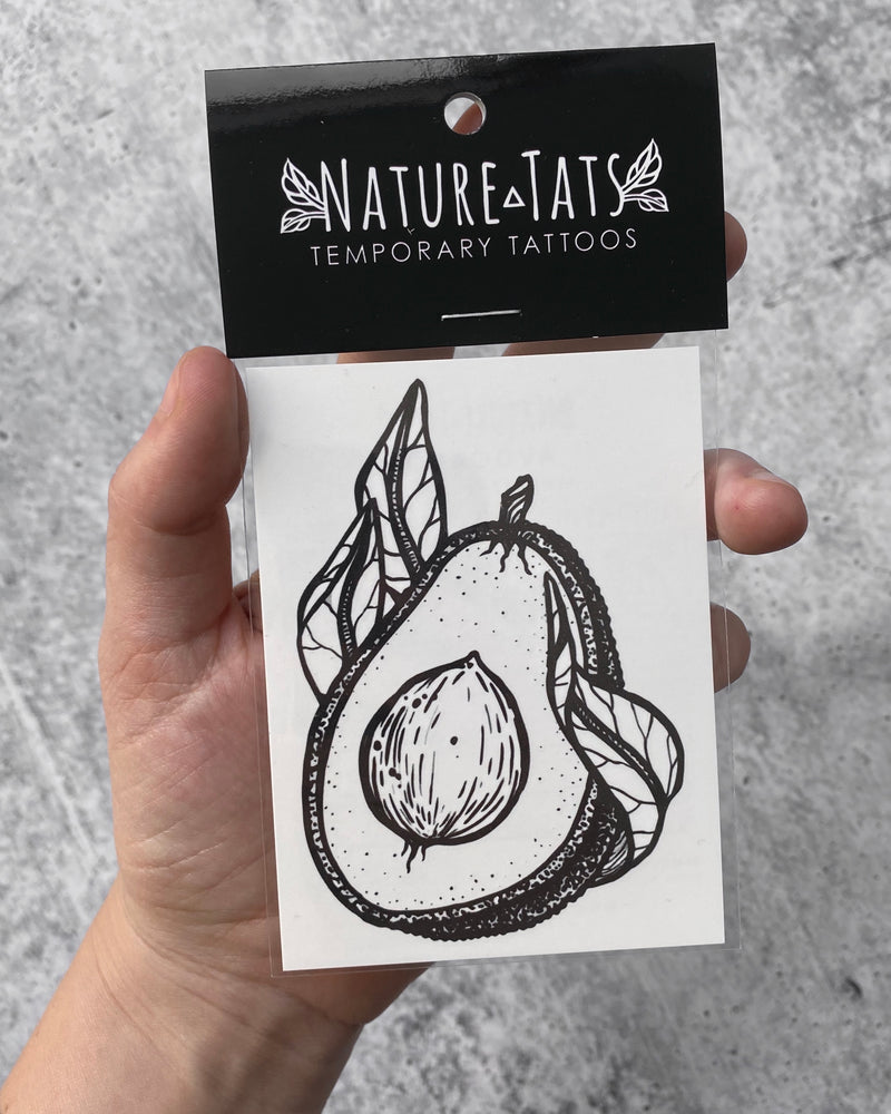 avocado temporary tattoo in packaging with a grey background 