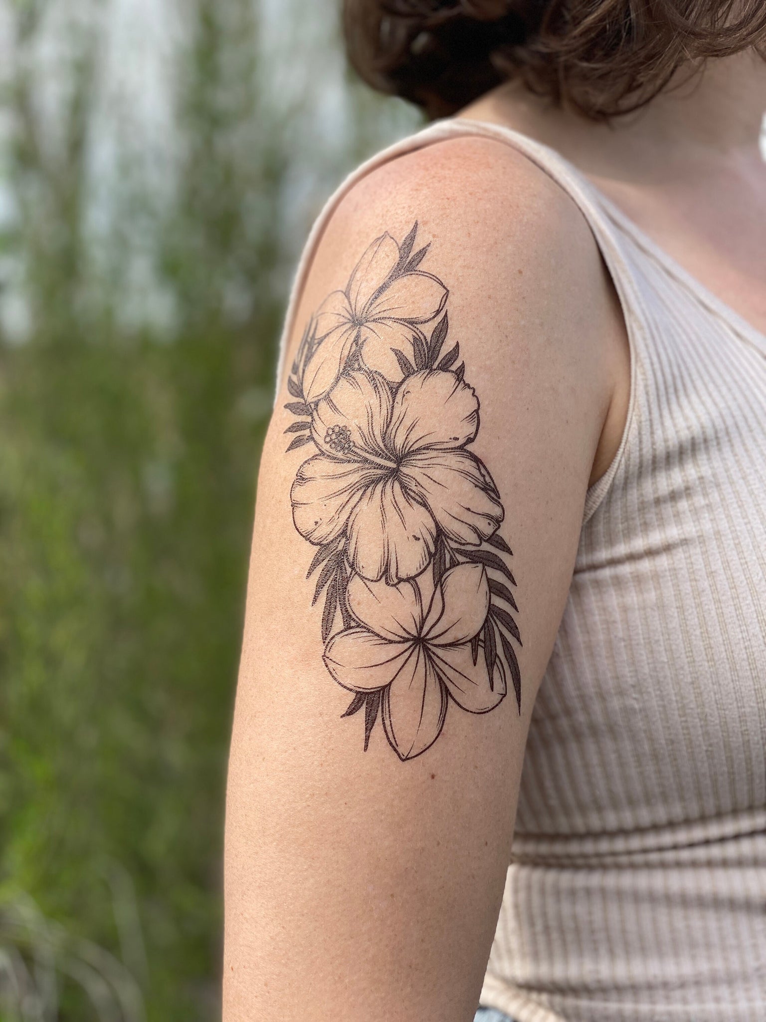 Plumeria tattoo black & white | Plumeria tattoo, Flower tattoo shoulder,  Plumeria flower tattoos