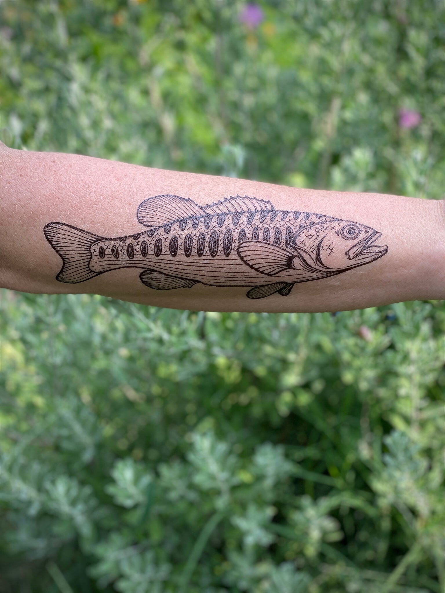 Traditional fish tattoo on the thigh - Tattoogrid.net